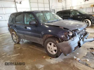 2004 Ford Escape XLS with VIN 1FMYU92154KA14600, listed as a Copart auction lot 83101474 with 305,444 mi miles and Salvage Title. Bid and sale history available at DreamBid. Image 4.