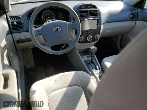 2009 Kia Spectra LX with VIN KNAFE221295606992, listed as a Copart auction lot 72767494 with 163,041 mi miles and Salvage Title. Bid and sale history available at carsss.com. Image 8.