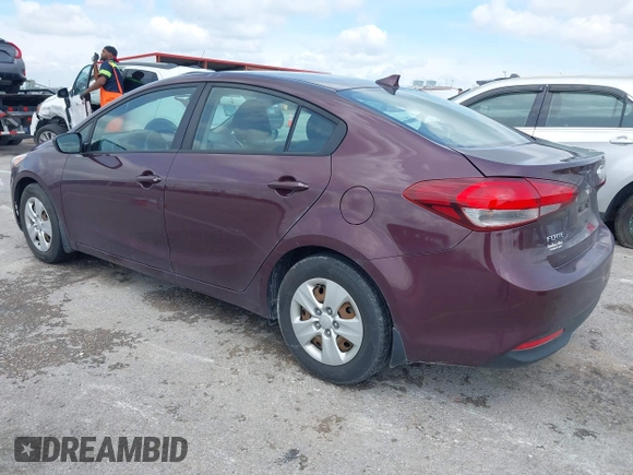 2018 Kia Forte LX with VIN 3KPFK4A70JE165286, listed as a IAAI auction lot 42128779 with 124,348 mi miles. Bid and sale history available at carsss.com. Image 3.