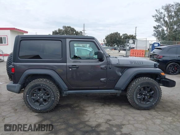 2022 Jeep Wrangler Willys Sport with VIN 1C4GJXAN7NW252931, listed as a IAAI auction lot 40972143 with 12,823 mi miles and . Bid and sale history available at DreamBid. Image 13.