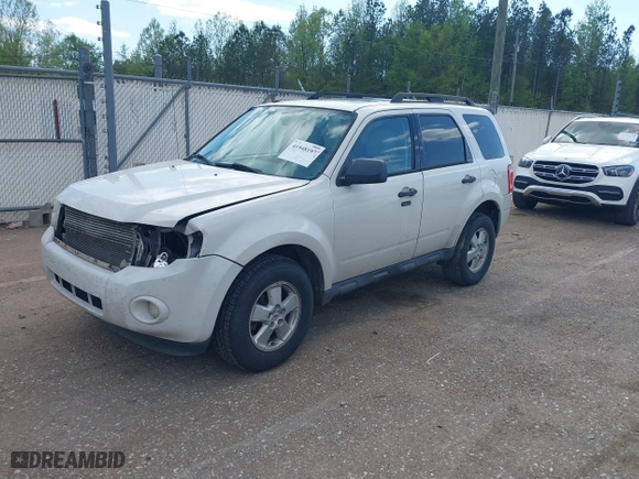 2010 Ford Escape XLT with VIN 1FMCU0DG3AKC46213, listed as a IAAI auction lot 41948197 with 167,761 mi miles. Bid and sale history available at carsss.com. Image 2.