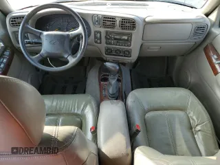 2000 Oldsmobile Bravada z VIN 1GHDT13W9Y2384823, wystawiony jako Copart lot #83105794 z przebiegiem Nie podano mil oraz Tytuł czysty. Historia ofert i sprzedaży dostępna na DreamBid. Obrazek 8.