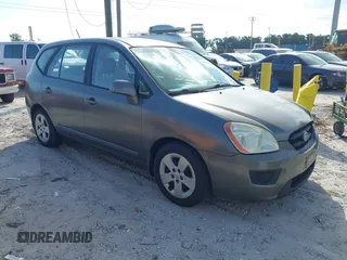 2009 Kia Rondo LX with VIN KNAFG528797267899, listed as a IAAI auction lot 42020740 with 141,113 mi miles. Bid and sale history available at carsss.com. Image 1.