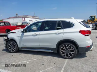 2020 BMW X1 xDrive28i with VIN WBXJG9C04L5R18165, listed as a IAAI auction lot 42313313 with 46,815 mi miles and . Bid and sale history available at DreamBid. Image 15.