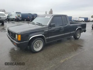 1991 Mitsubishi Mighty Max z VIN JA7FL25W7MP028365, wystawiony jako Copart lot #43964285 z przebiegiem 175 102 mil mil oraz Szkody całkowita. Historia ofert i sprzedaży dostępna na DreamBid. Obrazek 1.