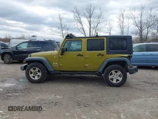 2008 Jeep Wrangler Unlimited X with VIN 1J4GA39158L529523, listed as a IAAI auction lot 41979992 with 304,641 mi miles and . Bid and sale history available at DreamBid. Image 14.