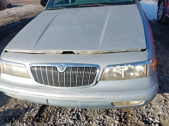 1996 Mercury Grand Marquis GS with VIN 2MELM74W7TX616694, listed as a IAAI auction lot 41216582 with 127,486 mi miles and . Bid and sale history available at DreamBid. Image 6.