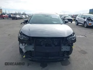 2023 Mazda CX-30 S Carbon Edition with VIN 3MVDMBCM7PM589019, listed as a IAAI auction lot 41251168 with 23,847 mi miles and . Bid and sale history available at DreamBid. Image 6.