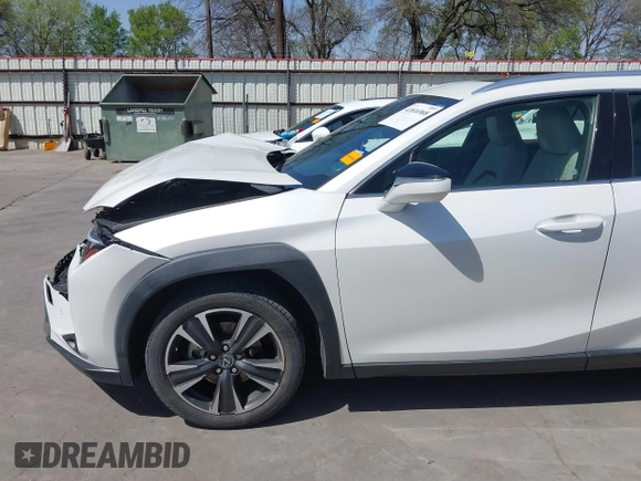 2020 Lexus UX with VIN JTHP9JBH6L2031919, listed as a IAAI auction lot 41816968 with 57,848 mi miles. Bid and sale history available at carsss.com. Image 18.