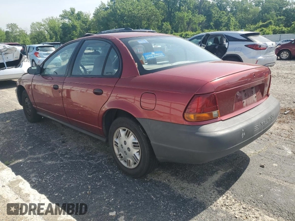 1999 Saturn SL z VIN 1G8ZH5288XZ273509, wystawiony jako Copart lot #55508215 z przebiegiem 168 946 mil mil oraz Szkoda całkowita • Salvage title. Historia ofert i sprzedaży dostępna na DreamBid. Obrazek 2.