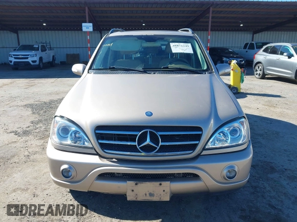 2002 Mercedes-Benz M 320/430/500 with VIN 4JGAB75E42A322824, listed as a IAAI auction lot 41871249 with 203,845 mi miles and . Bid and sale history available at carsss.com. Image 12.