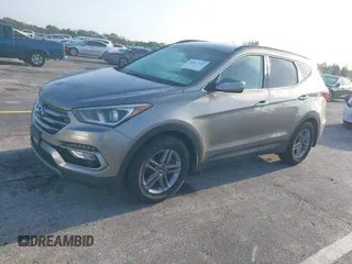 2017 Hyundai Santa Fe 2.4L z VIN 5XYZU3LB0HG420910, wystawiony jako IAAI lot #42017552 z przebiegiem 184 666 mil mil oraz . Historia ofert i sprzedaży dostępna na DreamBid. Obrazek 17.