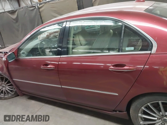 2006 Acura RL z VIN JH4KB16566C008802, wystawiony jako IAAI lot #41457360 z przebiegiem 212 443 mil mil oraz . Historia ofert i sprzedaży dostępna na DreamBid. Obrazek 14.