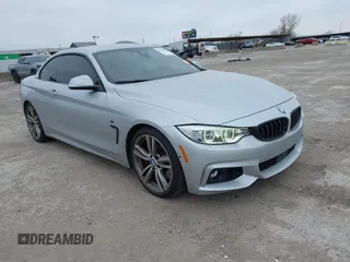 2014 BMW 4 Series 435i z VIN WBA3T3C55EP737428, wystawiony jako IAAI lot #41347382 z przebiegiem 129 513 mil mil oraz . Historia ofert i sprzedaży dostępna na DreamBid. Obrazek 1.