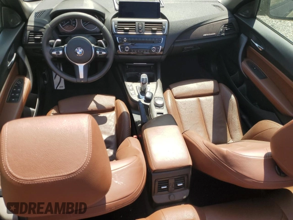 2017 BMW 2 Series with VIN WBA2L1C34HV666785, listed as a Copart auction lot 61775835 with 57,386 mi miles and Salvage title. Bid and sale history available at DreamBid. Image 8.