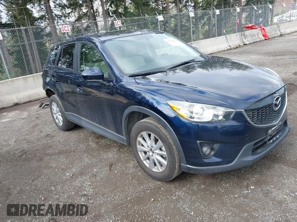 2015 Mazda CX-5 Touring with VIN JM3KE4CY5F0453646, listed as a IAAI auction lot 41740574 with 91,167 mi miles. Bid and sale history available at carsss.com. Image 1.