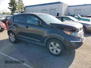2012 Kia Sportage LX с VIN KNDPB3A21C7345995, выставлен на аукционе Copart как лот 51629505 с пробегом 129 255 миль миль и Списание • Salvage title. История ставок и продаж доступна на DreamBid. Изображение 4.