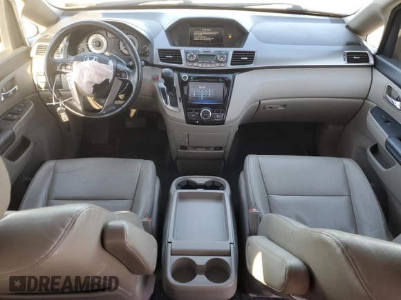 2014 Honda Odyssey EX-L with VIN 5FNRL5H61EB005740, listed as a Copart auction lot 54663595 with 118,971 mi miles and Salvage Title. Bid and sale history available at DreamBid. Image 8.