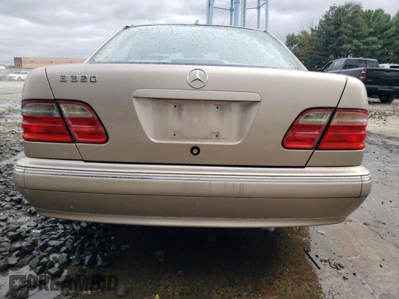 2001 Mercedes-Benz E-Class with VIN WDBJF65J01B389296, listed as a Copart auction lot 71933404 with 124,392 mi miles and Salvage Title. Bid and sale history available at carsss.com. Image 6.