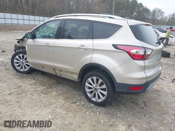 2017 Ford Escape Titanium with VIN 1FMCU0JD2HUC30884, listed as a IAAI auction lot 41801272 with 111,644 mi miles. Bid and sale history available at carsss.com. Image 3.
