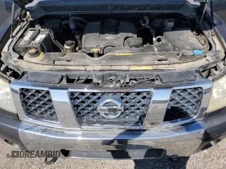 2005 Nissan Titan LE with VIN 1N6BA07B95N571880, listed as a Copart auction lot 57527435 with 199,577 mi miles and Salvage title. Bid and sale history available at DreamBid. Image 11.