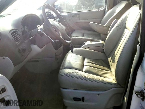 2005 Dodge Caravan SXT with VIN 2D4GP44L45R585381, listed as a Copart auction lot 66082085 with 195,700 mi miles and Salvage title. Bid and sale history available at DreamBid. Image 7.