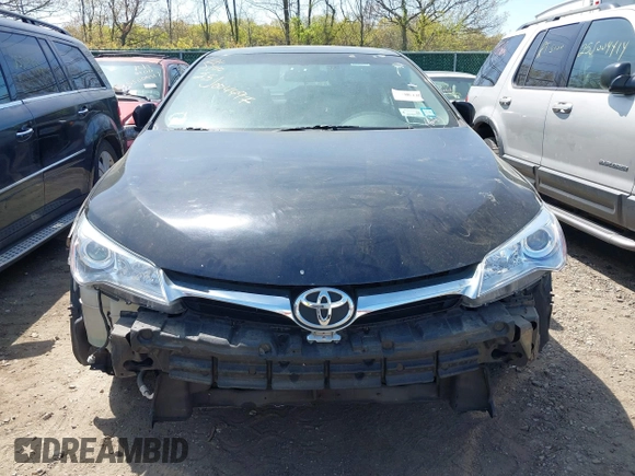2015 Toyota Camry LE z VIN 4T1BD1FK7FU159767, wystawiony jako IAAI lot #42175153 z przebiegiem Nie podano mil oraz . Historia ofert i sprzedaży dostępna na DreamBid. Obrazek 11.