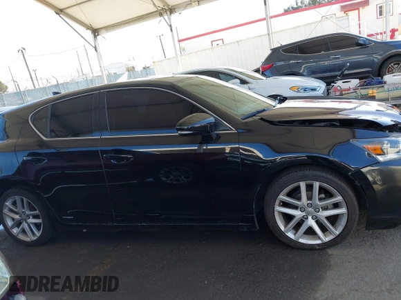2015 Lexus CT 200h z VIN JTHKD5BHXF2237930, wystawiony jako IAAI lot #42261009 z przebiegiem 195 014 mil mil oraz . Historia ofert i sprzedaży dostępna na DreamBid. Obrazek 13.