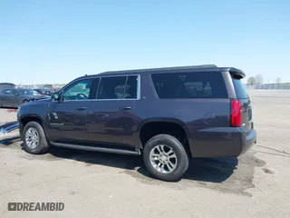 2018 Chevrolet Suburban LT with VIN 1GNSCHKCXJR128787, listed as a IAAI auction lot 41909965 with 123,020 mi miles. Bid and sale history available at carsss.com. Image 14.