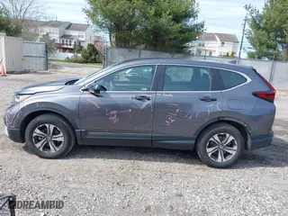 2021 Honda CR-V LX with VIN 2HKRW2H29MH632687, listed as a IAAI auction lot 41876112 with 105,301 mi miles. Bid and sale history available at carsss.com. Image 14.
