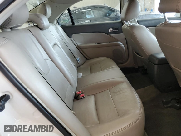 2012 Ford Fusion SEL z VIN 3FAHP0JG9CR164030, wystawiony jako Copart lot #62926985 z przebiegiem 136 043 mil mil oraz Szkoda całkowita • Salvage title. Historia ofert i sprzedaży dostępna na DreamBid. Obrazek 10.