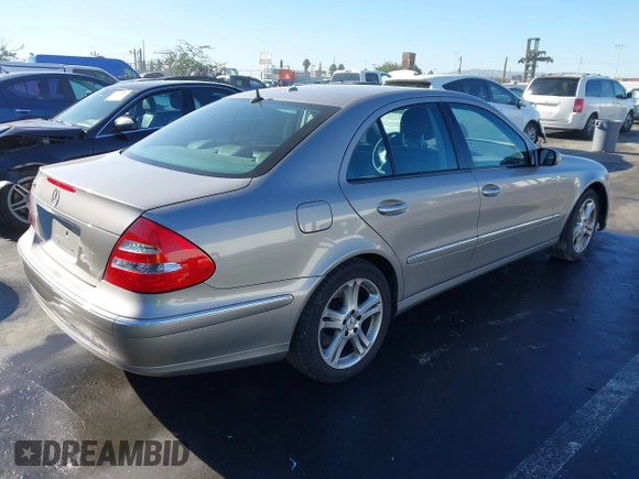 2006 Mercedes-Benz E-Class 3.5L with VIN WDBUF56JX6A959436, listed as a IAAI auction lot 41139788 with 99,915 mi miles. Bid and sale history available at carsss.com. Image 4.