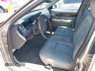 2004 Mercury Grand Marquis LS Premium with VIN 2MEFM75W04X659688, listed as a IAAI auction lot 42026540 with 144,088 mi miles and . Bid and sale history available at DreamBid. Image 5.