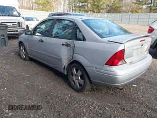 2004 Ford Focus ZTS with VIN 1FAFP38Z74W154059, listed as a IAAI auction lot 41695294 with 146,270 mi miles and . Bid and sale history available at carsss.com. Image 3.