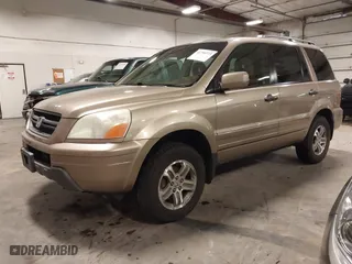 2004 Honda Pilot EX with VIN 2HKYF18464H567384, listed as a IAAI auction lot 41790773 with 142,534 mi miles. Bid and sale history available at carsss.com. Image 19.