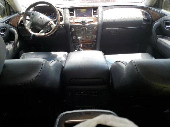 2014 Infiniti QX80 with VIN JN8AZ2NE1E9067594, listed as a Copart auction lot 60652435 with 109,062 mi miles and Salvage title. Bid and sale history available at DreamBid. Image 8.