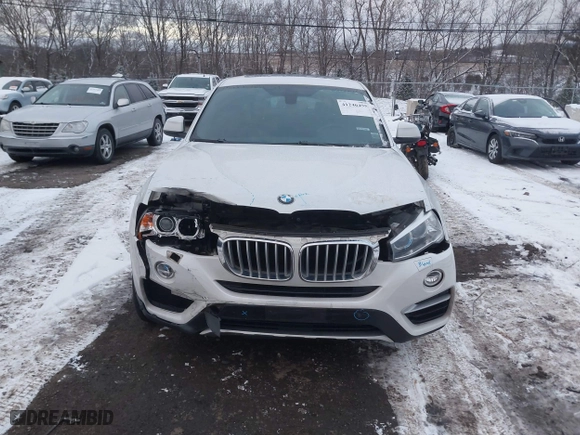 2018 BMW X4 xDrive28i with VIN 5UXXW3C5XJ0T82043, listed as a IAAI auction lot 41246495 with 106,606 mi miles. Bid and sale history available at carsss.com. Image 12.