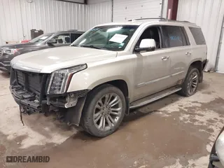 2017 Cadillac Escalade Premium Luxury with VIN 1GYS4CKJ9HR390988, listed as a IAAI auction lot 41626132 with 166,185 mi miles. Bid and sale history available at carsss.com. Image 2.
