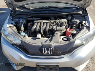 2015 Honda Fit EX-L z VIN 3HGGK5H8XFM766048, wystawiony jako Copart lot #56436135 z przebiegiem 67 587 mil mil oraz Szkoda całkowita • Salvage title. Historia ofert i sprzedaży dostępna na DreamBid. Obrazek 11.