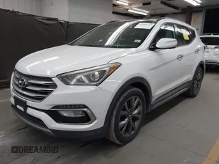 2017 Hyundai Santa Fe Ultimate with VIN 5NMZW4LA0HH040141, listed as a IAAI auction lot 42603243 with 140,817 mi miles and . Bid and sale history available at DreamBid. Image 2.