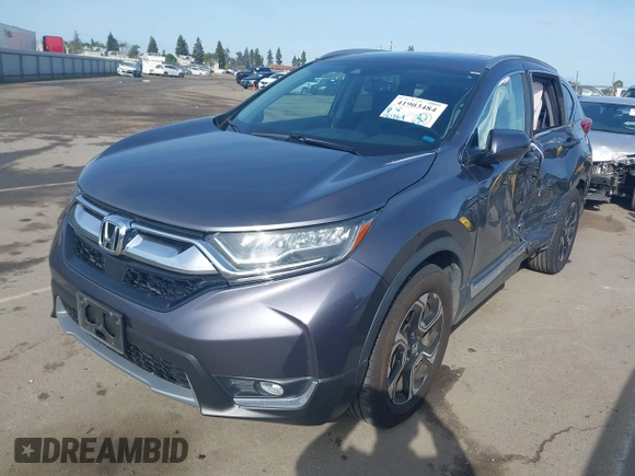 2018 Honda CR-V Touring with VIN 7FARW1H93JE027294, listed as a IAAI auction lot 41903484 with 80,999 mi miles and . Bid and sale history available at DreamBid. Image 23.