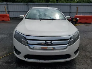 2010 Ford Fusion Hybrid with VIN 3FADP0L36AR203663, listed as a Copart auction lot 60310095 with 211,922 mi miles and Salvage title. Bid and sale history available at DreamBid. Image 5.