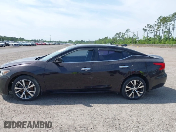 2016 Nissan Maxima SL with VIN 1N4AA6AP9GC436537, listed as a IAAI auction lot 42103091 with 131,181 mi miles and . Bid and sale history available at DreamBid. Image 14.