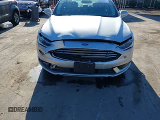 2018 Ford Fusion SE with VIN 3FA6P0LU1JR272522, listed as a IAAI auction lot 41796432 with 123,471 mi miles and . Bid and sale history available at DreamBid. Image 6.