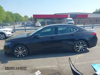 2015 Acura TLX z VIN 19UUB1F34FA022686, wystawiony jako IAAI lot #41975685 z przebiegiem 144 503 mil mil oraz . Historia ofert i sprzedaży dostępna na DreamBid. Obrazek 14.