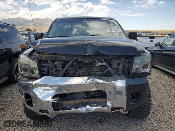 2010 Nissan Titan XE with VIN 1N6BA0EJ5AN318639, listed as a Copart auction lot 69776984 with 158,913 mi miles and Salvage Title. Bid and sale history available at carsss.com. Image 5.