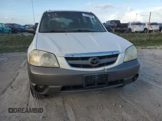 2002 Mazda Tribute LX with VIN 4F2YU09182KM09244, listed as a Copart auction lot 76758954 with Not Provided miles and Non Repairable. Bid and sale history available at carsss.com. Image 5.