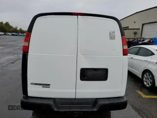 2014 Chevrolet Express Cargo Van with VIN 1GCWGGBA1E1193958, listed as a Copart auction lot 77208494 with 126,193 mi miles and Clean Title. Bid and sale history available at carsss.com. Image 6.