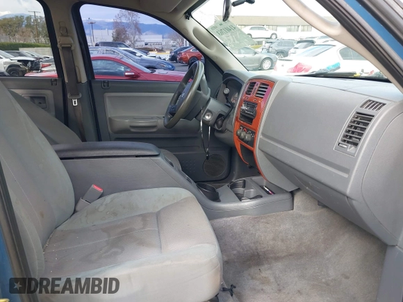 2005 Dodge Dakota SLT with VIN 1D7HE48N85S261745, listed as a IAAI auction lot 41401763 with 153,799 mi miles and . Bid and sale history available at DreamBid. Image 5.