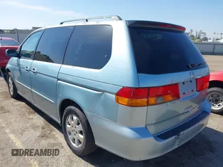 2003 Honda Odyssey EX-L with VIN 5FNRL18973B148675, listed as a IAAI auction lot 41992952 with 232,013 mi miles and . Bid and sale history available at DreamBid. Image 3.